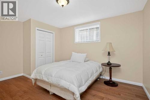 25 Westfall Drive, Okotoks, AB - Indoor Photo Showing Bedroom