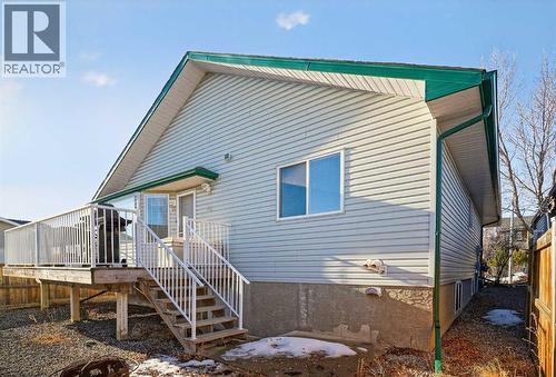 25 Westfall Drive, Okotoks, AB - Outdoor With Exterior