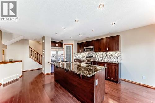 38 Springborough Way Sw, Calgary, AB - Indoor Photo Showing Kitchen With Upgraded Kitchen