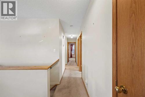 220 Sunset Place, Okotoks, AB - Indoor Photo Showing Other Room