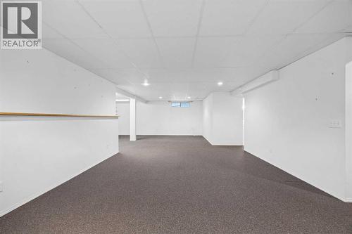 Basement Family Room - 220 Sunset Place, Okotoks, AB - Indoor Photo Showing Other Room