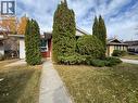 The front is made private with mature cedar trees - 467 Berkley Crescent Nw, Calgary, AB  - Outdoor 