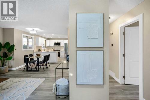 Fully updated main floor with new paint, flooring and baseboards/trim - 467 Berkley Crescent Nw, Calgary, AB - Indoor