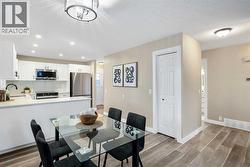 Spacious dining room can accomodate family gatherings - 