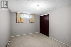 4th bedroom located in the basement.  Adding a egress window will make this bedroom up to todays code - 