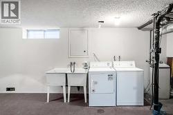 Laundry room with ample storage space - 