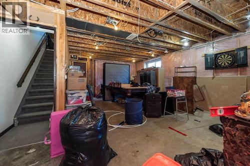 100 Willow Ridge Link, Diamond Valley, AB - Indoor Photo Showing Basement