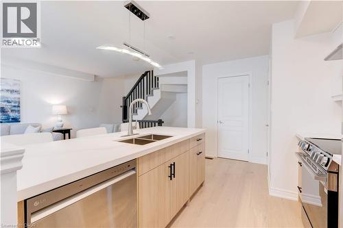 628 Garibaldi Common, Burlington, ON - Indoor Photo Showing Kitchen With Double Sink