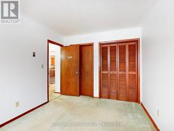 2nd bedroom with twin closets - 