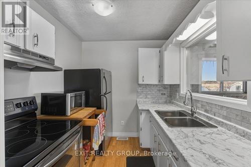 33 Willow Point Road, Brighton, ON - Indoor Photo Showing Kitchen With Double Sink