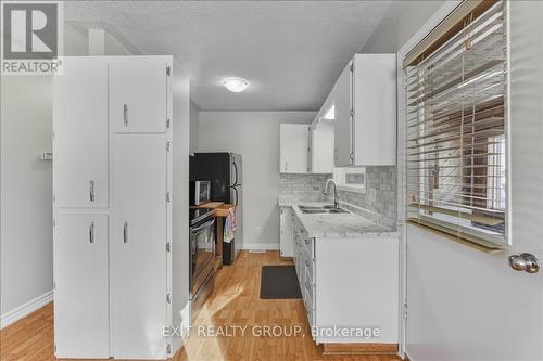 33 Willow Point Road, Brighton, ON - Indoor Photo Showing Kitchen With Double Sink