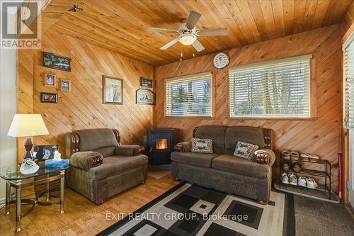 33 Willow Point Road, Brighton, ON - Indoor Photo Showing Other Room With Fireplace