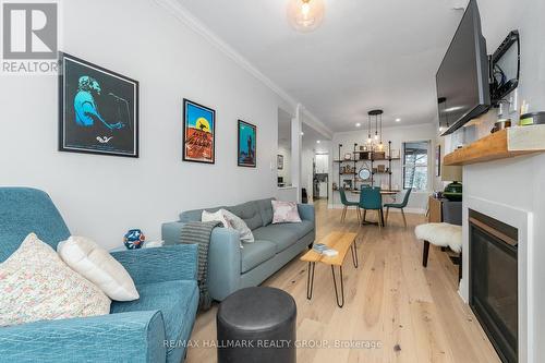 Living Room - Apartment #1 - 133 Bayswater Avenue, Ottawa, ON - Indoor Photo Showing Living Room With Fireplace