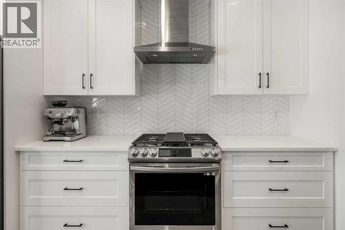 40 West Grove Link Sw, Calgary, AB - Indoor Photo Showing Kitchen