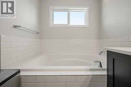 40 West Grove Link Sw, Calgary, AB - Indoor Photo Showing Bathroom