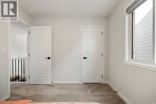40 West Grove Link Sw, Calgary, AB - Indoor Photo Showing Other Room
