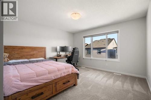 40 West Grove Link Sw, Calgary, AB - Indoor Photo Showing Bedroom