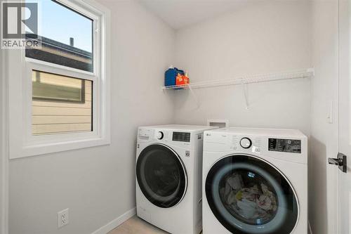 40 West Grove Link Sw, Calgary, AB - Indoor Photo Showing Laundry Room