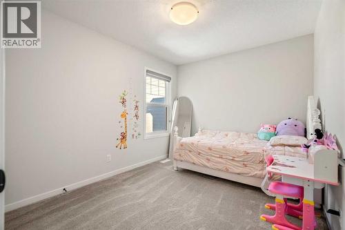 40 West Grove Link Sw, Calgary, AB - Indoor Photo Showing Bedroom