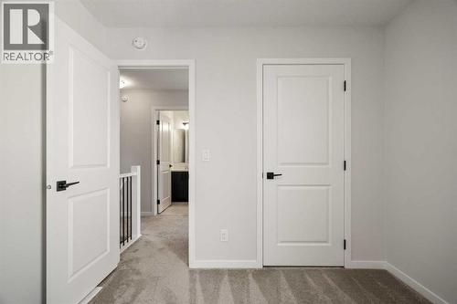 40 West Grove Link Sw, Calgary, AB - Indoor Photo Showing Other Room