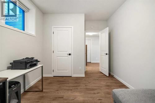40 West Grove Link Sw, Calgary, AB - Indoor Photo Showing Other Room