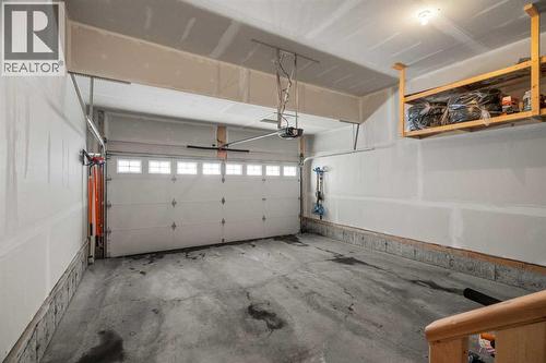 40 West Grove Link Sw, Calgary, AB - Indoor Photo Showing Garage