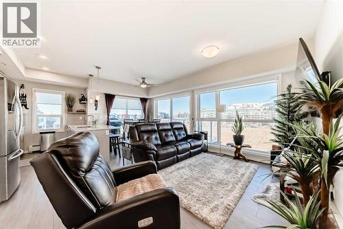 409, 4150 Seton Drive Se, Calgary, AB - Indoor Photo Showing Living Room