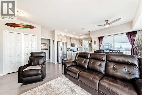 409, 4150 Seton Drive Se, Calgary, AB - Indoor Photo Showing Living Room