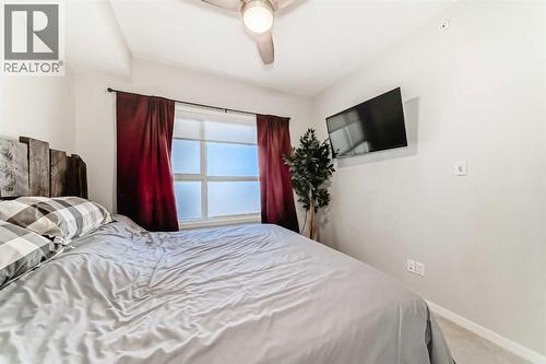 409, 4150 Seton Drive Se, Calgary, AB - Indoor Photo Showing Bedroom