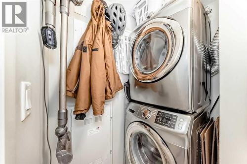 409, 4150 Seton Drive Se, Calgary, AB - Indoor Photo Showing Laundry Room