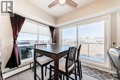 409, 4150 Seton Drive Se, Calgary, AB - Indoor Photo Showing Dining Room