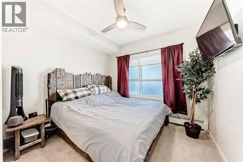 409, 4150 Seton Drive Se, Calgary, AB - Indoor Photo Showing Bedroom