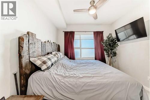 409, 4150 Seton Drive Se, Calgary, AB - Indoor Photo Showing Bedroom