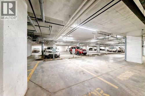 409, 4150 Seton Drive Se, Calgary, AB - Indoor Photo Showing Garage