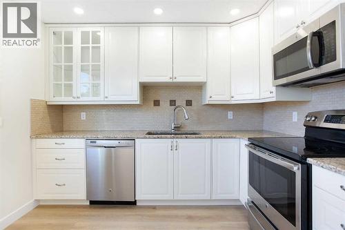 14668 Deer Run Drive Se, Calgary, AB - Indoor Photo Showing Kitchen With Upgraded Kitchen