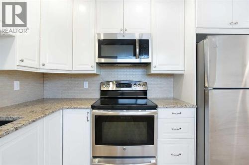 14668 Deer Run Drive Se, Calgary, AB - Indoor Photo Showing Kitchen
