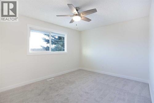 Primary bedroom - upstairs - 14668 Deer Run Drive Se, Calgary, AB - Indoor Photo Showing Other Room