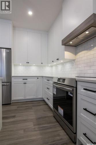 203 Sharma Lane, Saskatoon, SK - Indoor Photo Showing Kitchen With Upgraded Kitchen