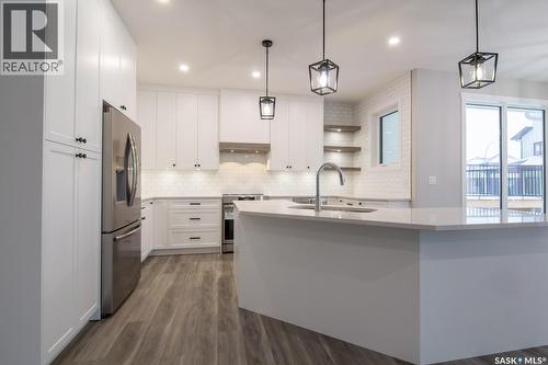 203 Sharma Lane, Saskatoon, SK - Indoor Photo Showing Kitchen With Upgraded Kitchen