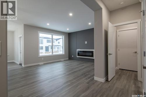 203 Sharma Lane, Saskatoon, SK - Indoor With Fireplace