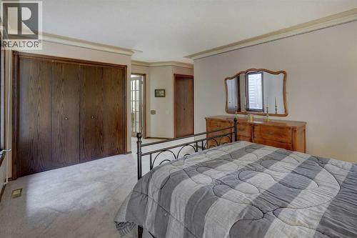 76 Edgeland Road Nw, Calgary, AB - Indoor Photo Showing Bedroom