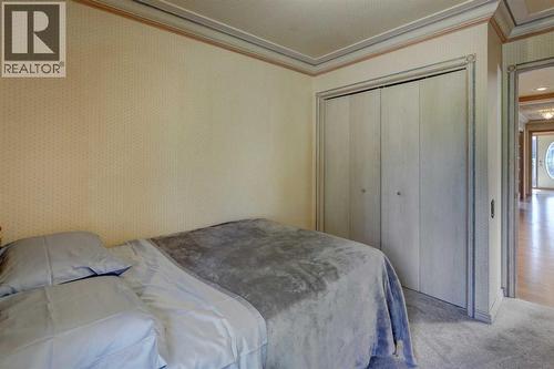 76 Edgeland Road Nw, Calgary, AB - Indoor Photo Showing Bedroom