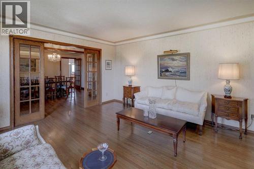 76 Edgeland Road Nw, Calgary, AB - Indoor Photo Showing Living Room