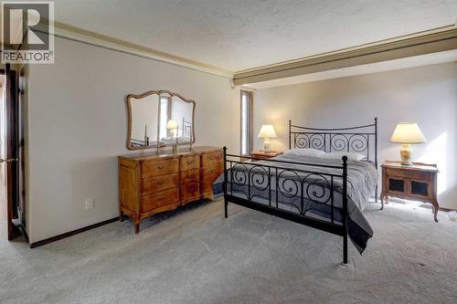 76 Edgeland Road Nw, Calgary, AB - Indoor Photo Showing Bedroom