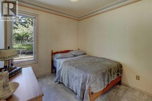 76 Edgeland Road Nw, Calgary, AB - Indoor Photo Showing Bedroom