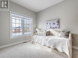 Main floor bedroom with large window - 