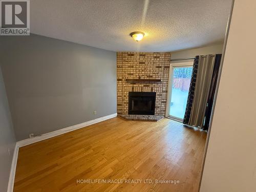 32 Hendricks Crescent, Brampton, ON - Indoor Photo Showing Living Room With Fireplace