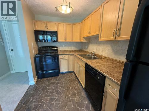 3 1811 8Th Avenue N, Regina, SK - Indoor Photo Showing Kitchen With Double Sink