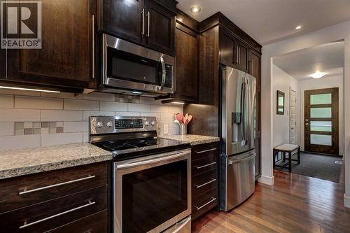 82 Gladys Ridge Road Sw, Calgary, AB - Indoor Photo Showing Kitchen With Stainless Steel Kitchen
