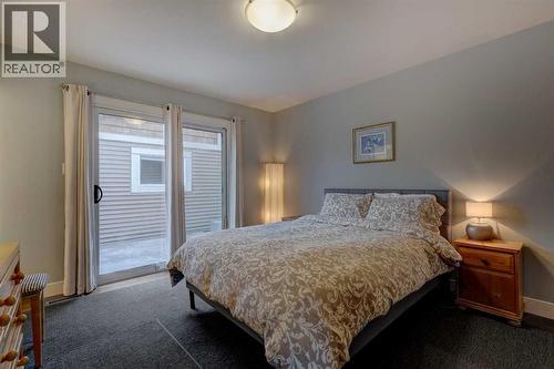 82 Gladys Ridge Road Sw, Calgary, AB - Indoor Photo Showing Bedroom